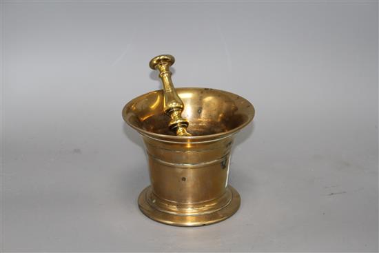 A 17th century style bronze pestle and mortar, height 12cm diameter 15.5cm, pestle 18cm